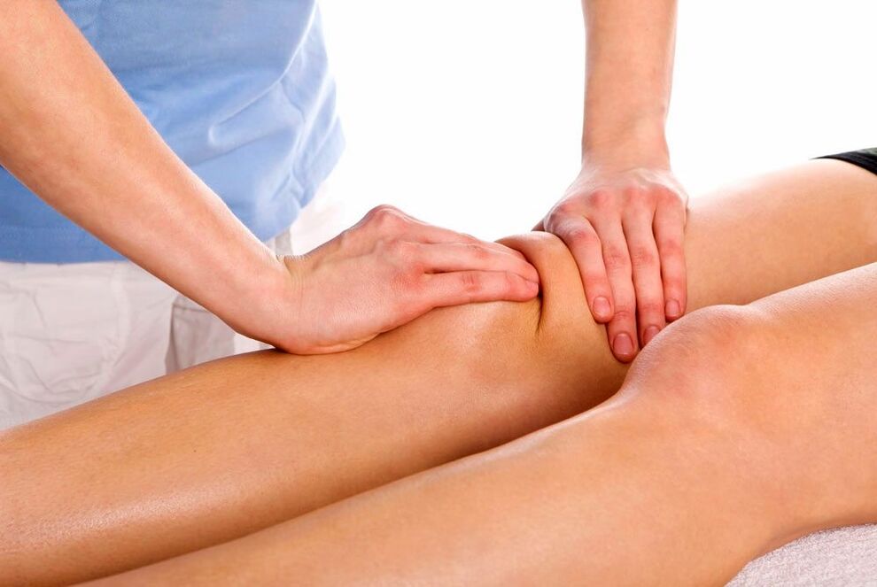 Therapeutic massage session for the injured knee